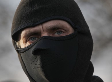 A pro-Russian activist makes barricades in eastern Ukraine.