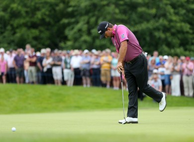 McDowell misses a birdie chance on the first green.
