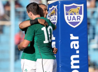 Jonny Sexton is the first to congratulate Simon Zebo on his try.