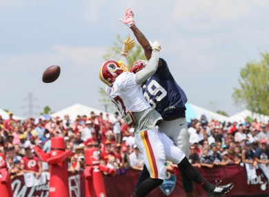 New England Patriots CB Brandon Browner breaks up a pass to Washington Redskins WR Cody Hoffman during an NFL Football training camp.