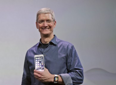 Apple CEO Tim Cook announcing the iPhone 6 and 6 Plus earlier this month.