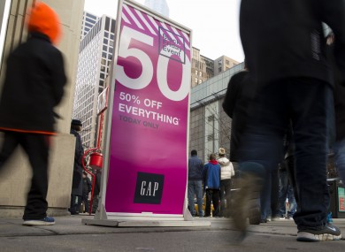 Shoppers walk down Michigan Ave. on Black Friday.