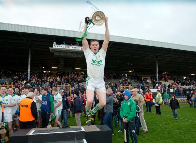 TJ Reid celebrates with the Kilkenny senior trophy.