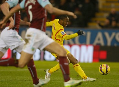 Liverpool's Raheem Sterling scores during the Barclays Premier League match at Turf Moor.