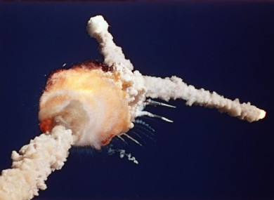 1986 file photo, the space shuttle Challenger explodes shortly after lifting off from the Kennedy Space Center in Cape Canaveral.