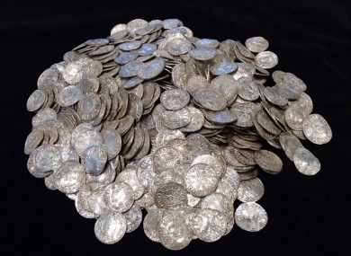 The buried treasure of coins one man found with his metal detector.