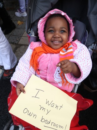 Hannah Komdwe (2) at a direct provision protest in November.
