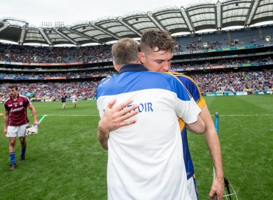 Eamon O'Shea consoles Seamus Callanan after Tipp's heartbreaking defeat.
