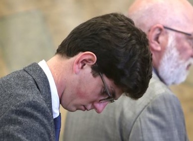 Owen Labrie hangs his head during yesterday's proceedings.