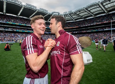Padraig Brehony and David Collins celebrate Galway's win.