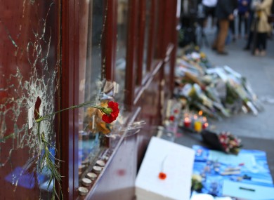Tributes are left at the La Carillon restaurant in Paris, following the attacks in the French capital.