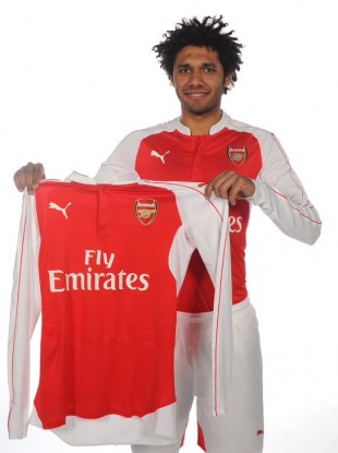 Elneney in Arsenal's red and white.