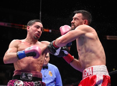 Garcia, left, won 116-112 on all three cards.