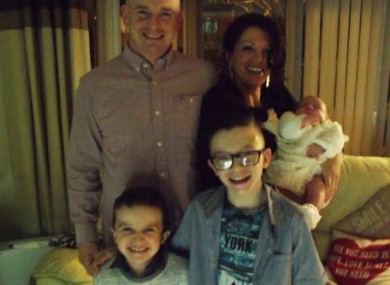 Louise James and her daughter Rioghnach-Ann, who was saved from the tragedy, along with her partner Sean McGrotty and sons Evan and Mark, who both died.