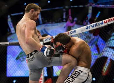 Brendan Loughnane landing a knee on Tom Duquesnoy at BAMMA 22 in Dublin last September.