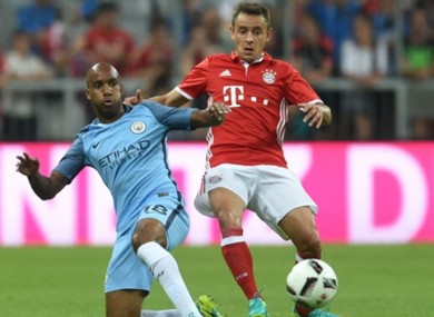 Fabian Delph (left) has been impressed by Guardiola's immediate impact.
