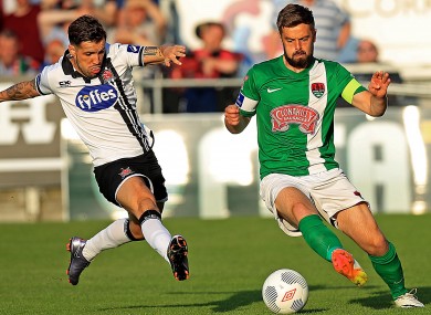 Greg Bolger under pressure from Darren Meenan during Cork City's win against Dundalk in June.