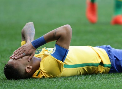 Brazil's Neymar reacts after missing a chance to score during a group A match of the men's Olympic football tournament between Brazil and South Africa at the National stadium.
