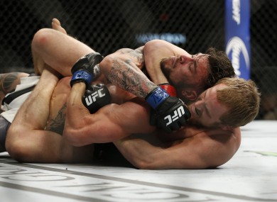 Gunnar Nelson submits Brabdon Thatch at UFC 189.