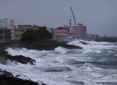 Waves caused by Hurricane Matthew impact on the malecon in Baracoa, Cuba, earlier today.