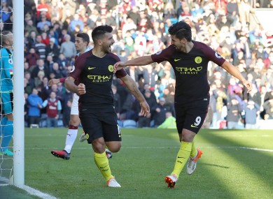 Manchester City's Sergio Aguero (left) celebrates with team-mate Nolito.