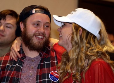 Republican supporters embrace as they watch election returns for Donald Trump at the Colorado Republican election night party.