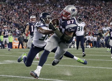 New England Patriots tight end Rob Gronkowski (87) catches a pass in front of Seattle Seahawks cornerback DeShawn Shead (35) during the second half.