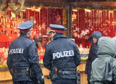 Police patrol a Christmas market in downtown Vienna, Austria last month