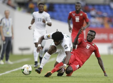 Ivory Coast's Franck Yannick Kessie, left, is challenged by Togo's Atakora Lalawewe.