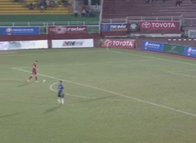 A goal is scored with ease as the goalkeeper steps out of the way.