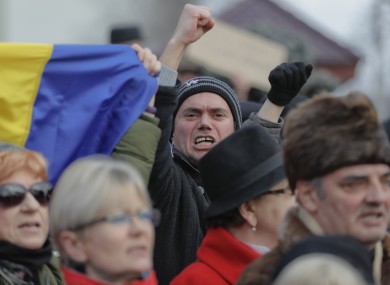 Demonstrators at a protest in Romanian capital Bucharest, yesterday.