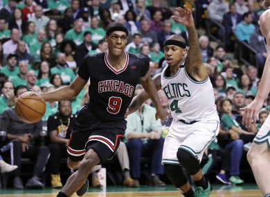 Chicago Bulls guard Rajon Rondo drives towards the basket past Isaiah Thomas of the Celtics.