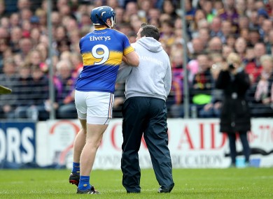 Davy Fitzgerald clashes with Tipperary's Jason Forde.