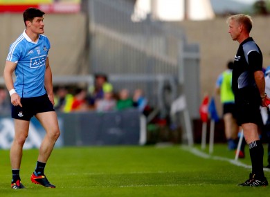 Diarmuid Connolly speaks to linesman Ciaran Branagan.