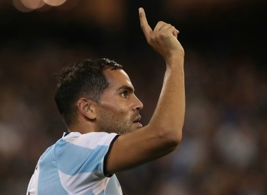 Argentina defender Gabriel Mercado celebrates after scoring the opener against Brazil.