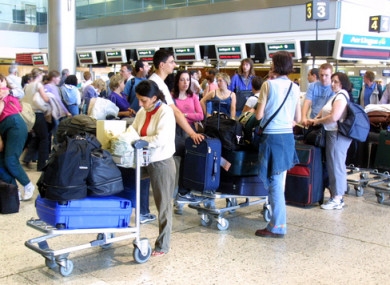 File photo of passengers waiting to board planes at Dublin Airport.