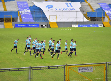 Australian soccer players jog during a training session at the Francisco Morazan Stadium in San Pedro Sula, Honduras.