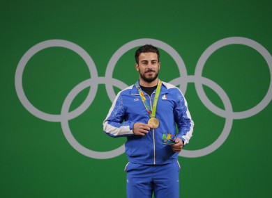 Kianoush Rostami with his Olympic gold medal.