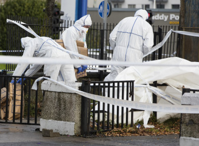 Garda Technical Bureau at the scene where a man in his late teens was found with gunshot injuries to the head in the front garden of a house at Shancastle Park, Clondalkin.