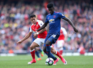 Tuanzebe alongside Man United's new signing Alexis Sanchez at the end of last season.