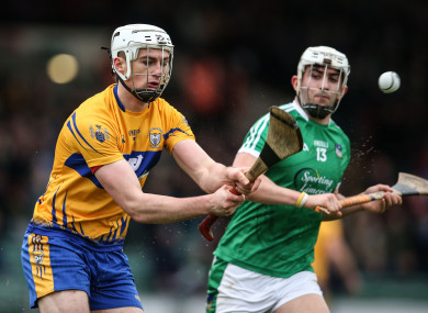 Clare's Conor Cleary and Limerick's Aaron Gillane in action.