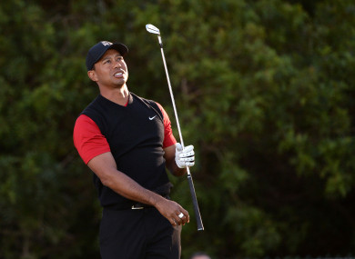 Tiger Woods plays his shot from the 11th tee during the final round of the Farmers Insurance Open golf tournament at Torrey Pines Municipal Golf Course.