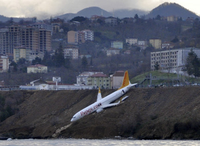 A Boeing 737-800 of Turkey's Pegasus Airlines after skidding off the runway downhill towards the sea at the airport in Trabzon.