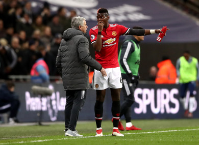 Mourinho giving Pogba instructions.