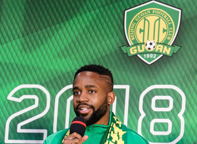 Cedric Bakambu of Beijing Guoan FC attends a press conference at Worker's Stadium.