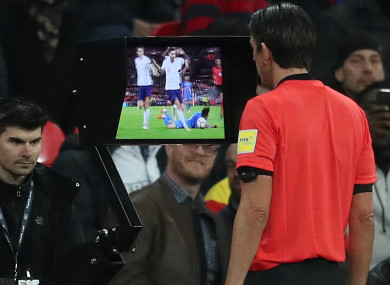Referee Deniz Aytekin consults VAR before awarding Italy a penalty against England recently.