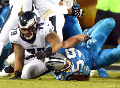 Brandon Brooks blocks Luke Kuechly.