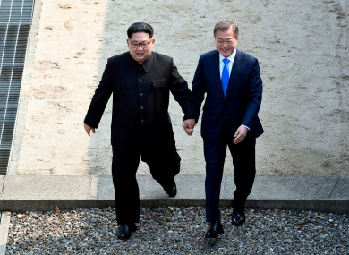 The leaders of North and South Korea hold hands as they meet for an historic summit last week.