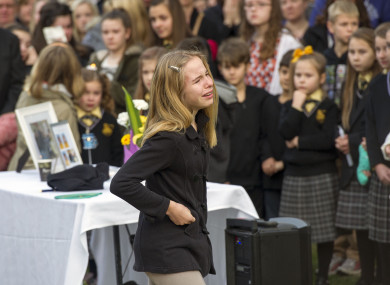 Relatives and friends gather for a memorial service for victims of MH17 plane crash.