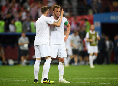 Kane is consoled by Phil Jones at full-time.